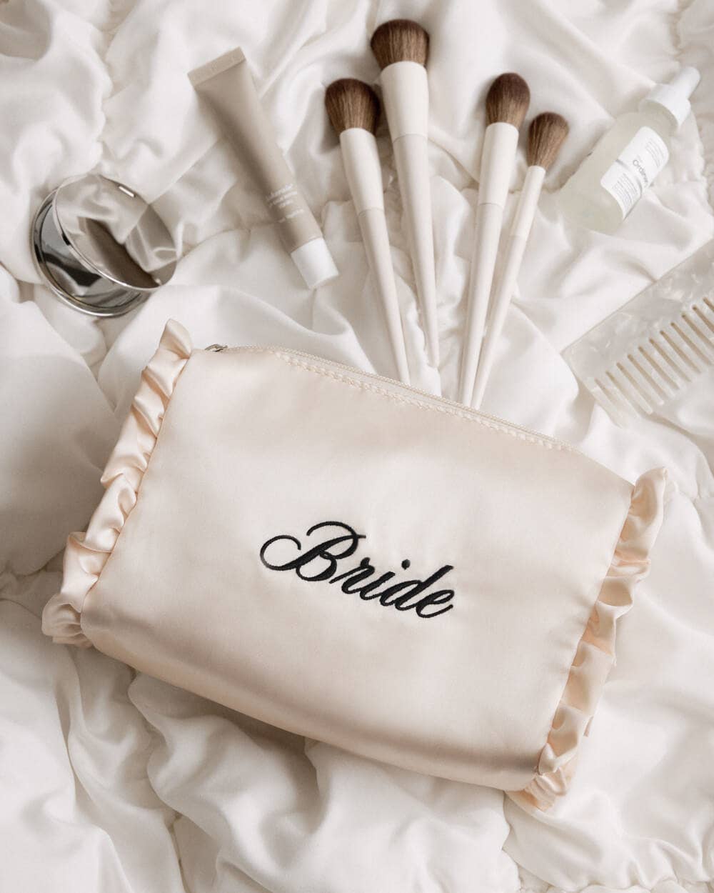 xo, Fetti - Embroidered Bride Satin Cosmetic Bag | bridal, ruffle, gift