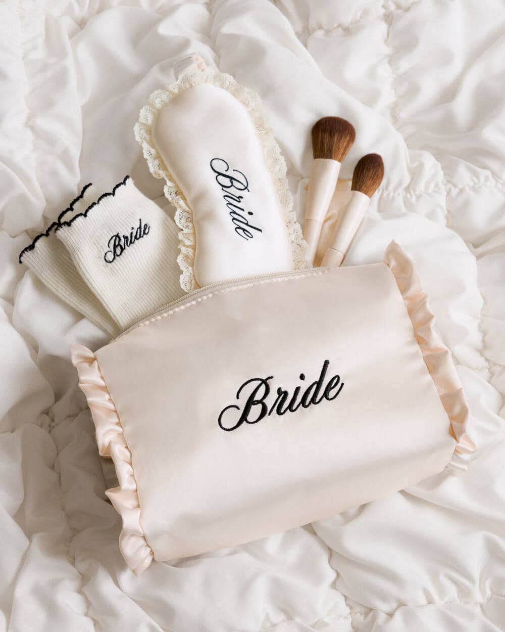 xo, Fetti - Embroidered Bride Satin Cosmetic Bag | bridal, ruffle, gift