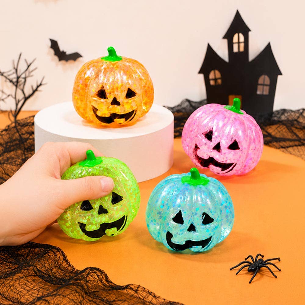 Sensibling Corp. - 12PCS - Glitter Halloween Pumpkin Squeeze Squishy Stress Relief Toy