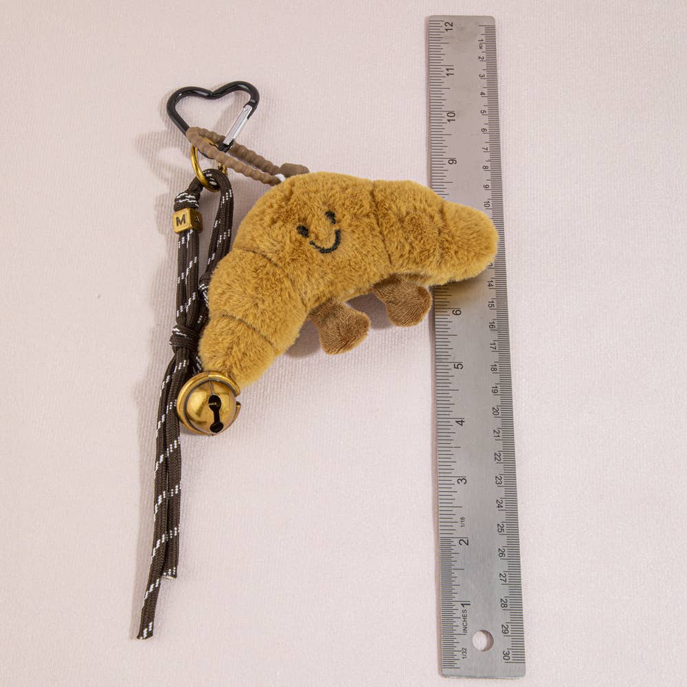 Collections by Fame Accessories - Plush Croissant Jingle Bell Bag Charm