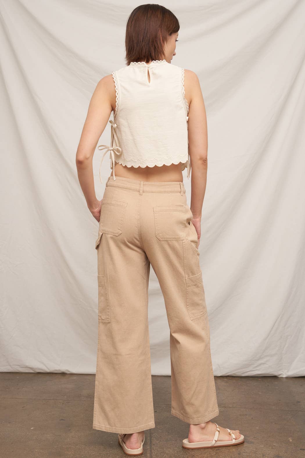 En Crème - Sleeveless Floral Embroidered Top with Side-Tie and Scallop