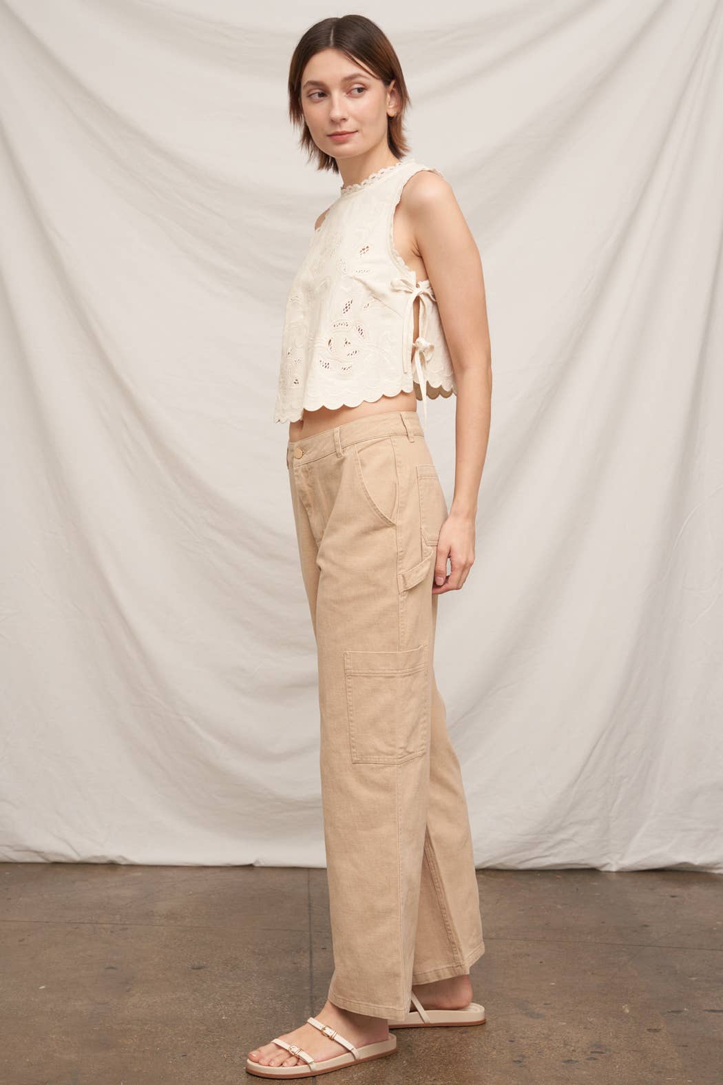 En Crème - Sleeveless Floral Embroidered Top with Side-Tie and Scallop