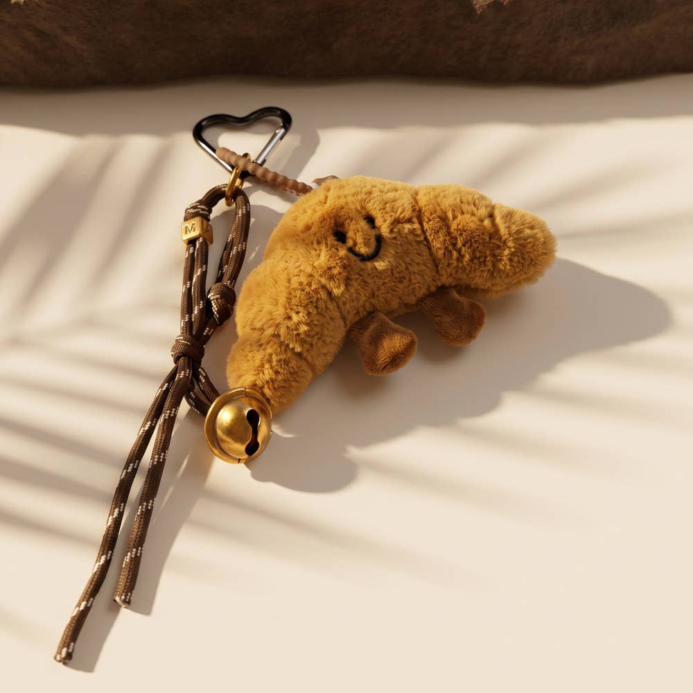Collections by Fame Accessories - Plush Croissant Jingle Bell Bag Charm