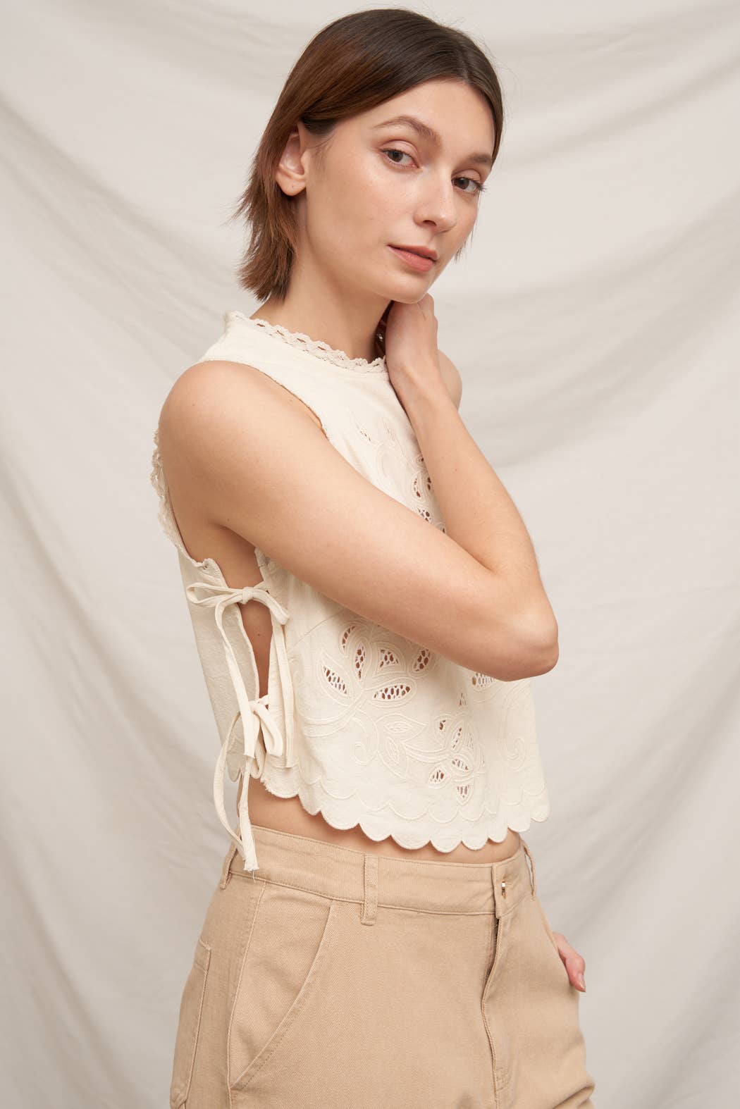 En Crème - Sleeveless Floral Embroidered Top with Side-Tie and Scallop