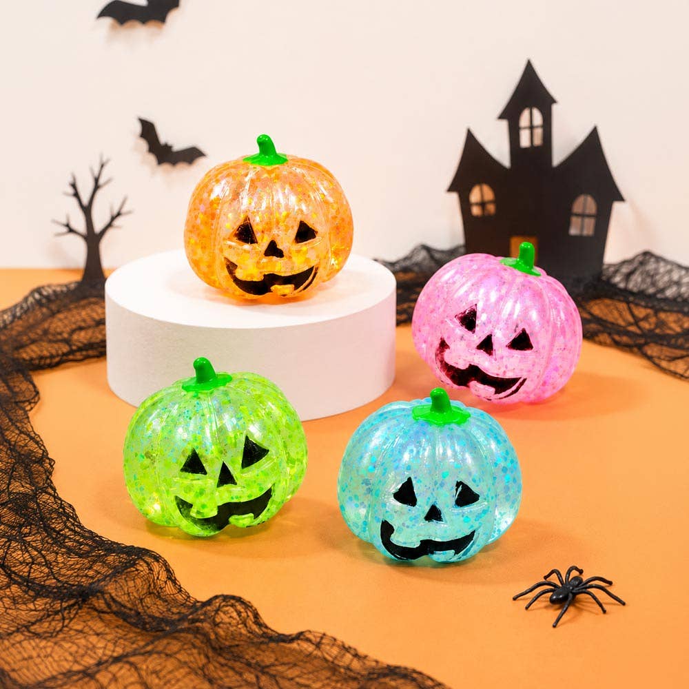 Sensibling Corp. - 12PCS - Glitter Halloween Pumpkin Squeeze Squishy Stress Relief Toy