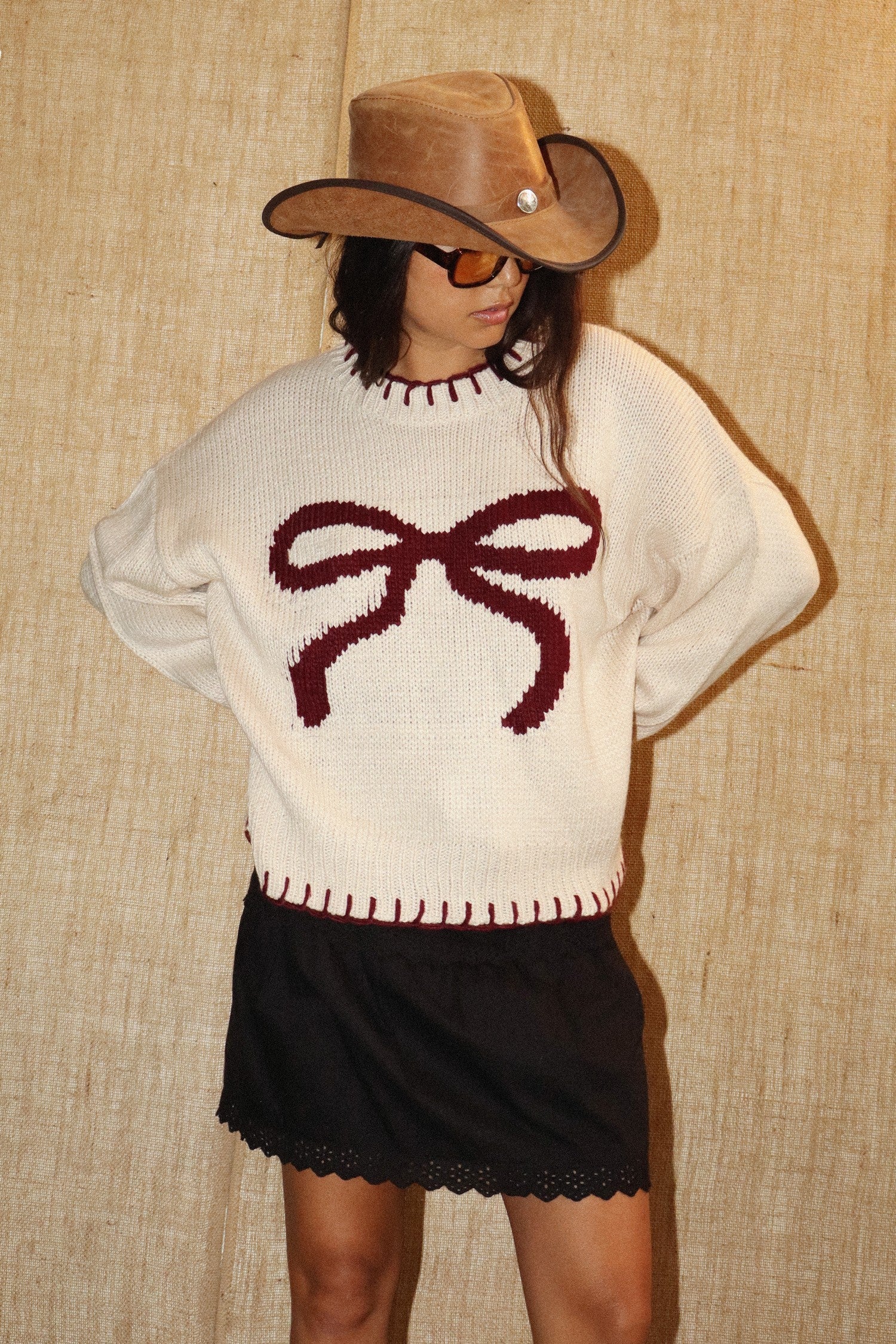 RIBBON SWEATER WITH STITCHING HEM