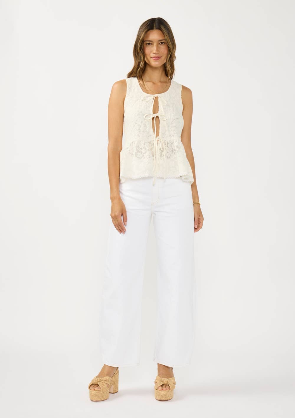 Lovestitch - Sleeveless Tie Front Smocked Peplum Top